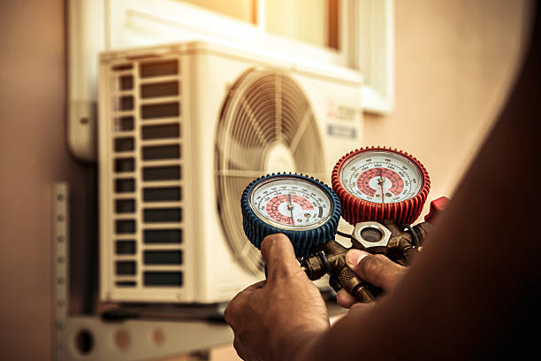 Professional Air Conditioning Service technician working in Acushnet, MA